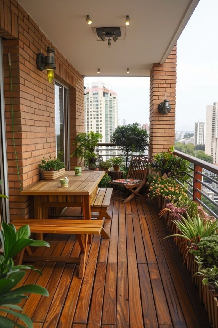 a balcony with wooden flooring and potted plants