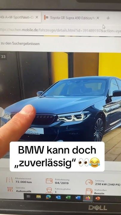 a hand is pointing at a car on a computer screen with the words bmv kann doch in german