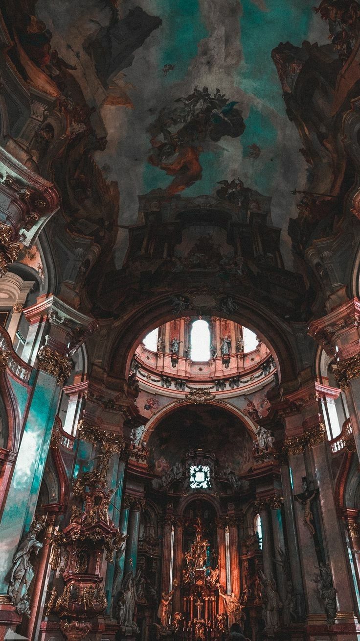 the interior of an old church with painted ceilings