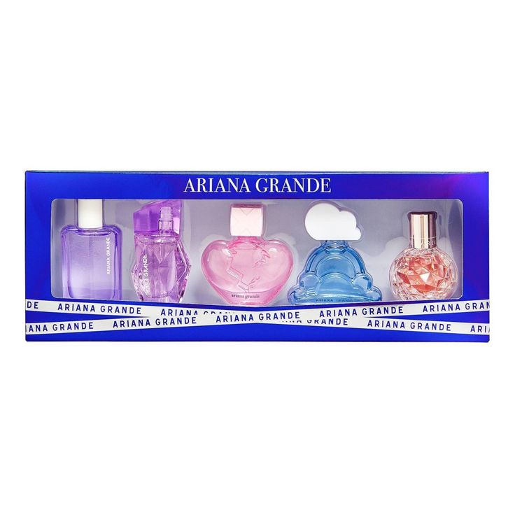 three perfume bottles in a blue box with the words ariana grande written on it