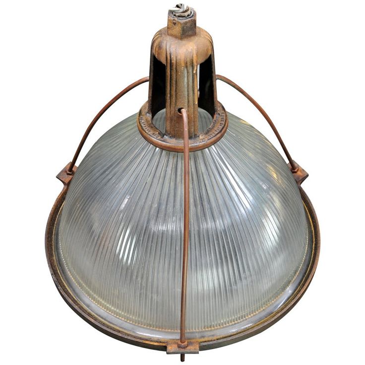 an old fashioned light fixture on a white background