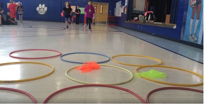 several children are playing with their toys in the gym