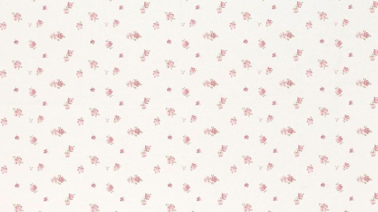 a white wall with pink flowers on it