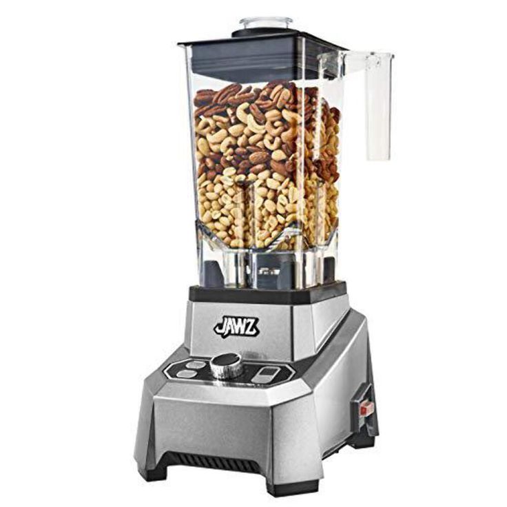 a blender filled with nuts on top of a white background