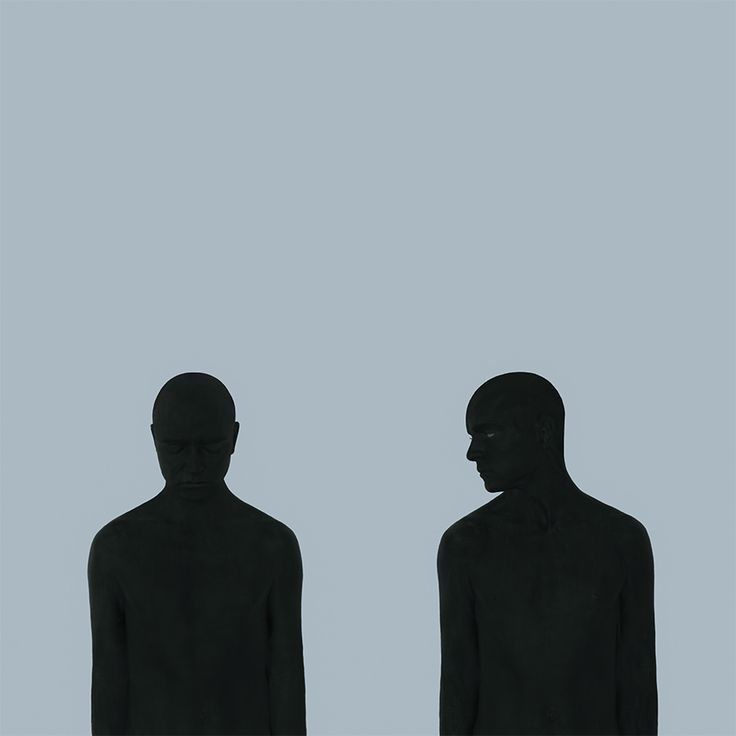 two people standing next to each other in front of a gray background with the same person's face