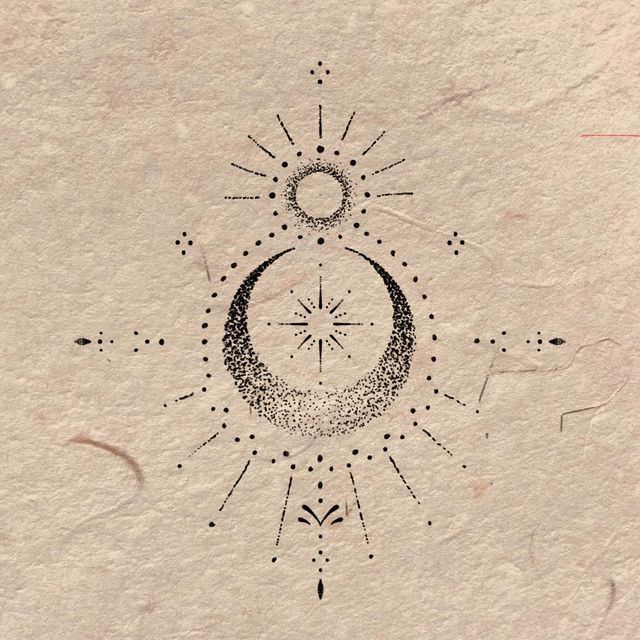 the sun and moon are drawn on paper