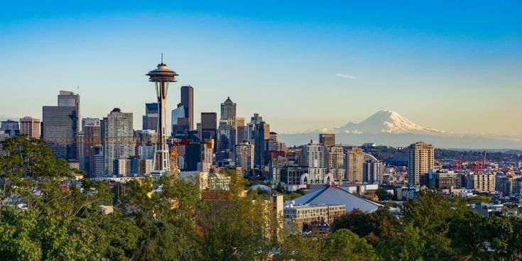 the seattle skyline with mt rainier in the background