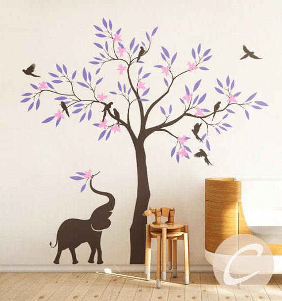 an elephant under a tree with pink flowers and birds on the branch wall decal