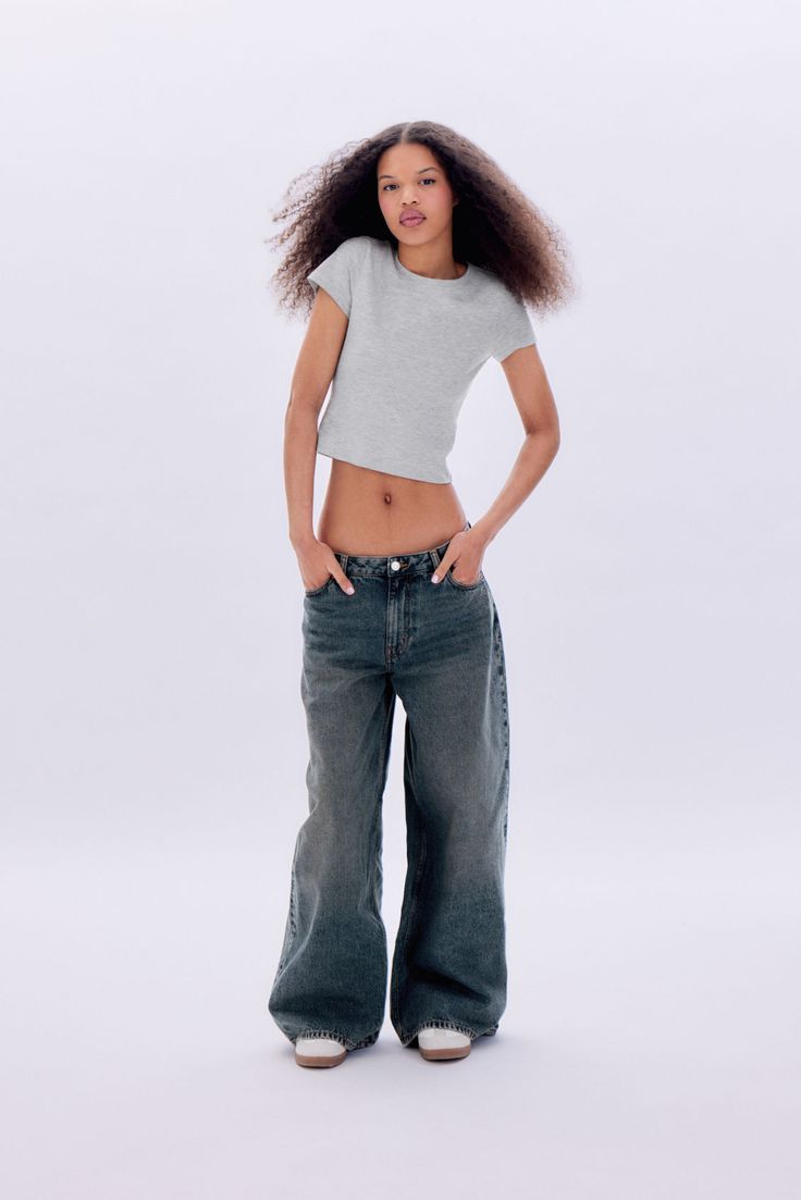 A pair of low-waisted baggy wide-leg jeans, crafted from an organic cotton rigid denim enhanced with recycled cotton. These favourites feature a classic 5-pocket design, a zip fly, and stitched rivets. Loose fit.Low waist.Full length.Wide leg.Non-stretch. Baggy Washed Jeans, Low Waisted Joggers, Low Waisted Baggy Jeans Outfit, Low Waisted Jeans Mid Size, Low Waist Loose Jeans, How To Stretch Jeans, Jeans Low Rise Baggy, Low Baggy Jeans, Low Rise Baggy Jeans 90s