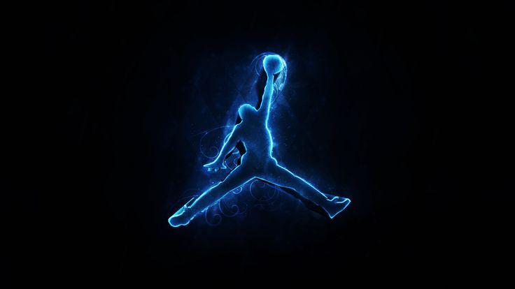 the basketball player is jumping in the air with his foot up and glowing blue lights behind him