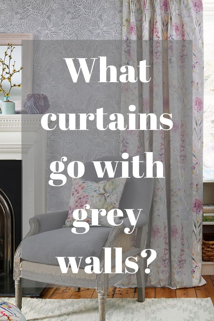 a chair sitting in front of a fireplace with the words what curtains go with grey walls?