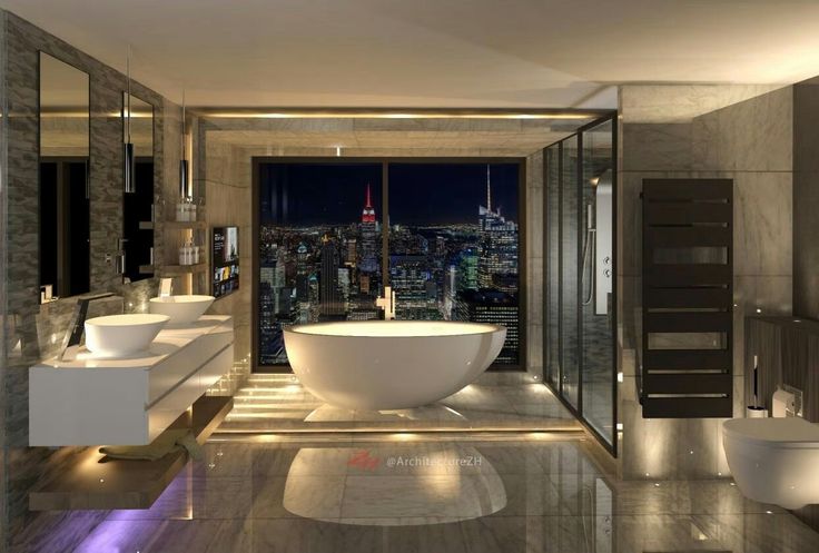 a large bathroom with two sinks and a bathtub in the middle of the room