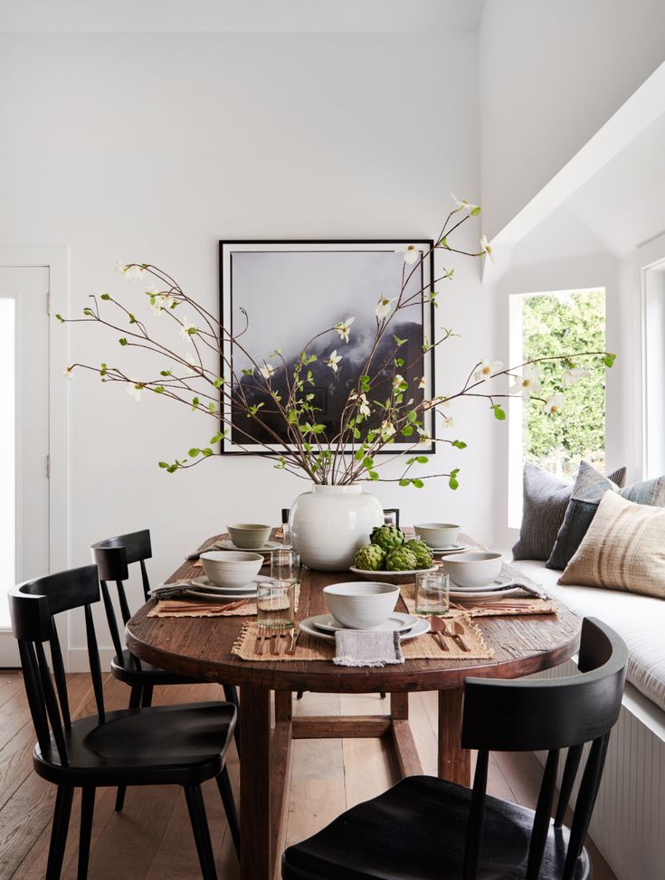 the instagram page on instagram shows an image of a dining room table and chairs