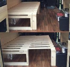 the inside of a camper van with wood flooring and storage compartments on each side