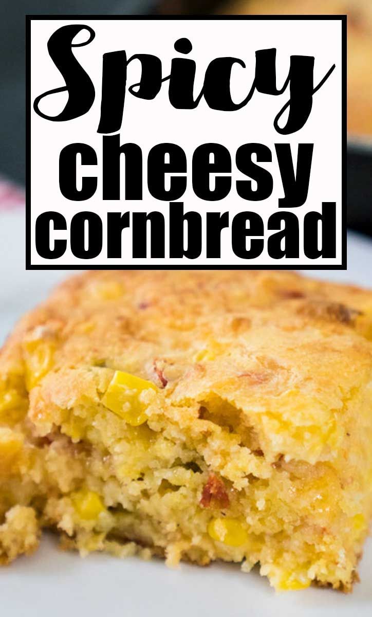 a piece of cornbread on a plate with the words spicy cheesy cornbread above it