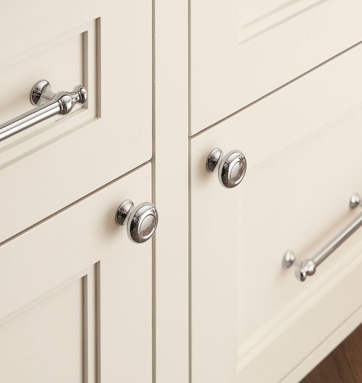 a close up view of some drawers with handles and knobs