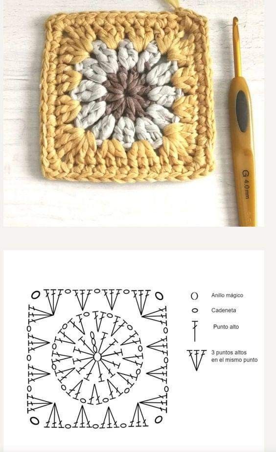 the crocheted square is next to a knitting needle