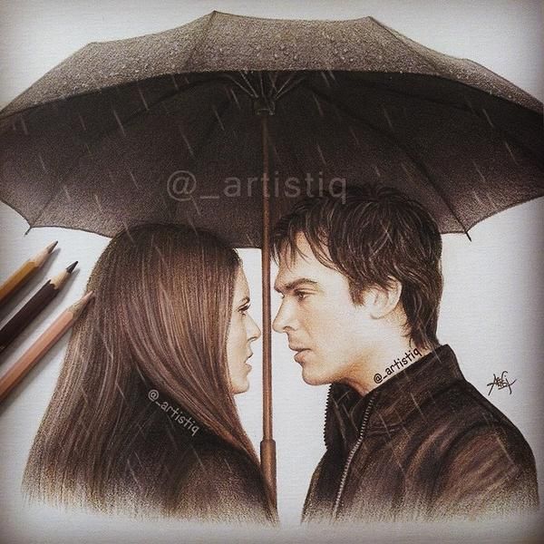 a drawing of a couple under an umbrella with colored pencils on the table next to them