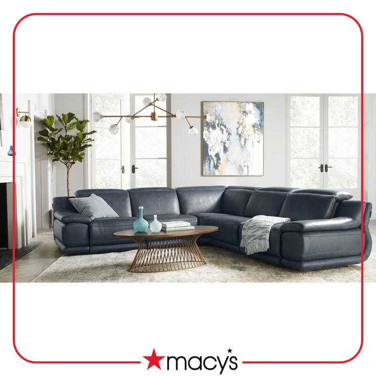 a living room with a sectional couch and coffee table