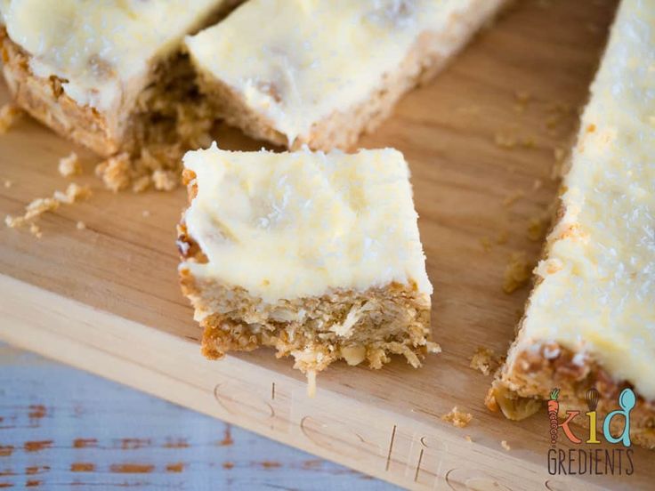 there are several pieces of cake on the cutting board with one slice missing from it