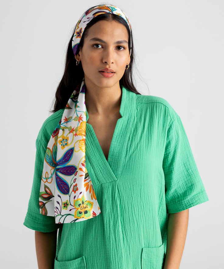 This versatile, 100% silk scarf adds a colorful floral pop to a spring or summer ensemble. Wear it as a flowing head wrap, tie it around the neck or even wear it as an eye-catching belt. Dimensions: 13 in. x 72 in.Materials: 100% Silk Made in: China Spring Floral Print Casual Bandana, Casual Spring Floral Print Bandana, Summer Vacation Bandana, Trendy White Scarves For Summer, Trendy White Summer Scarves, Summer Floral Print Bandana, Floral Print Bandana For Summer, Elegant Silk Scarf For Beach Spring Season, Elegant Silk Scarf For Beach And Spring