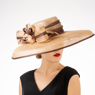 Sophisticated ladies Kentucky Derby hat in neutral tan. This beautiful hat will complement almost any outfit. Also available in pink. Feminine Fitted Hat With Curved Brim, Feminine Adjustable Hats For Kentucky Derby, Fitted Beige Wide Brim Fedora, Feminine Adjustable Hat For Kentucky Derby, Kentucky Derby Hats With Structured Crown, Luxury Beige Wide Brim Straw Hat, Luxury Beige Straw Hat With Wide Brim, Chic Beige Curved Brim Sun Hat, Feminine Short Brim Hat For Kentucky Derby