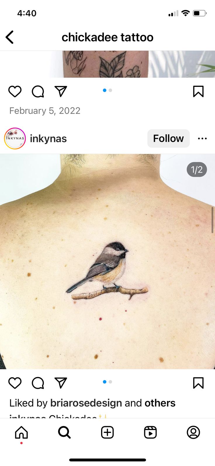 the back of a woman's neck with a bird on it and other tattoos