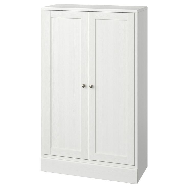 a white cabinet with two doors on the front