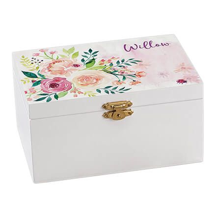 a white box with flowers painted on the side and name written in pink, yellow and green