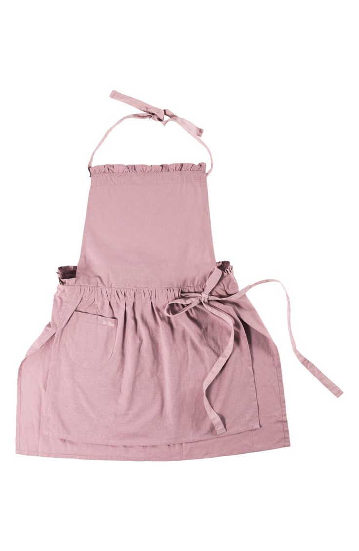 a pink apron on a white background with a tie at the waist and straps down