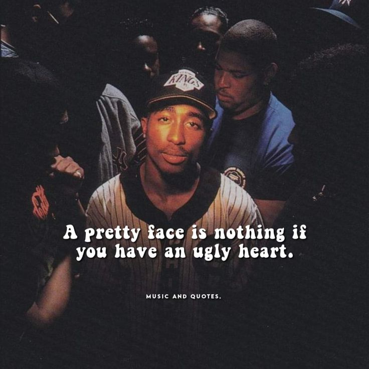 a baseball player with a quote on his face in the middle of a group of people