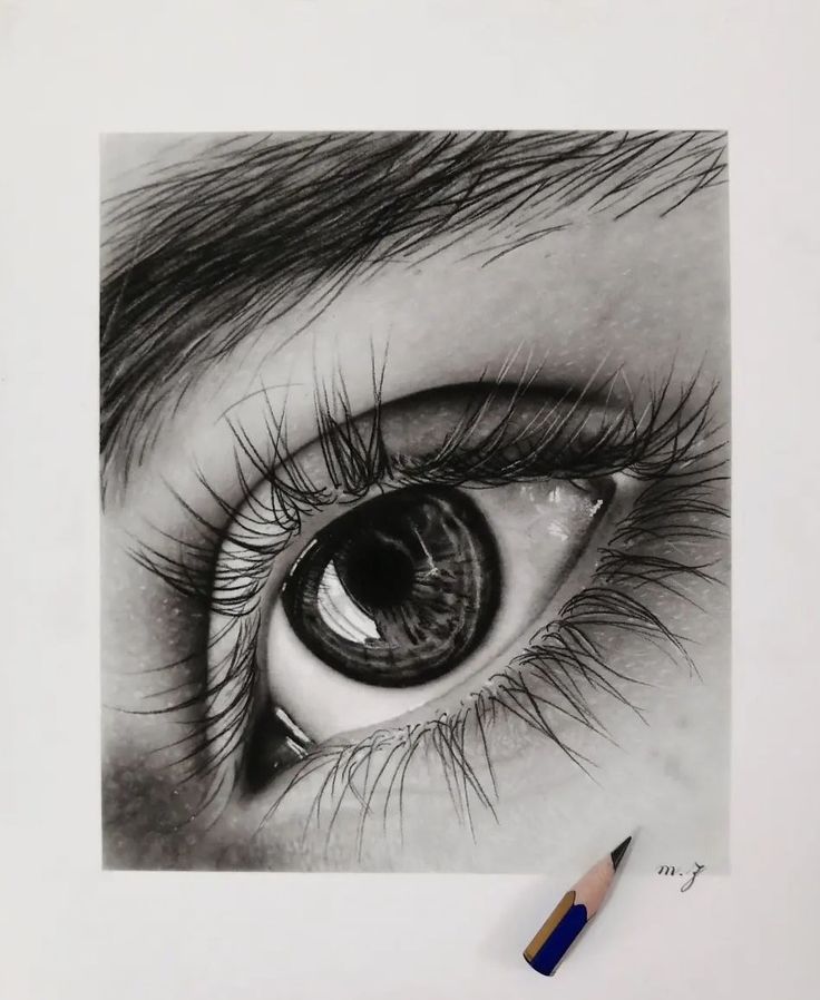 a pencil drawing of an eye with long lashes