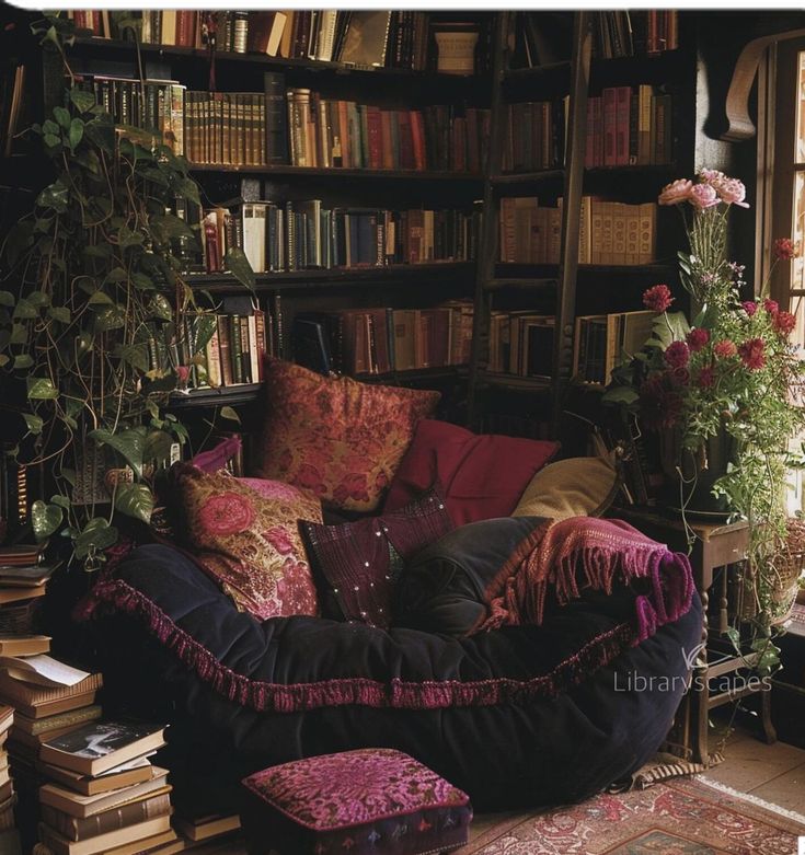 a living room filled with lots of books and furniture