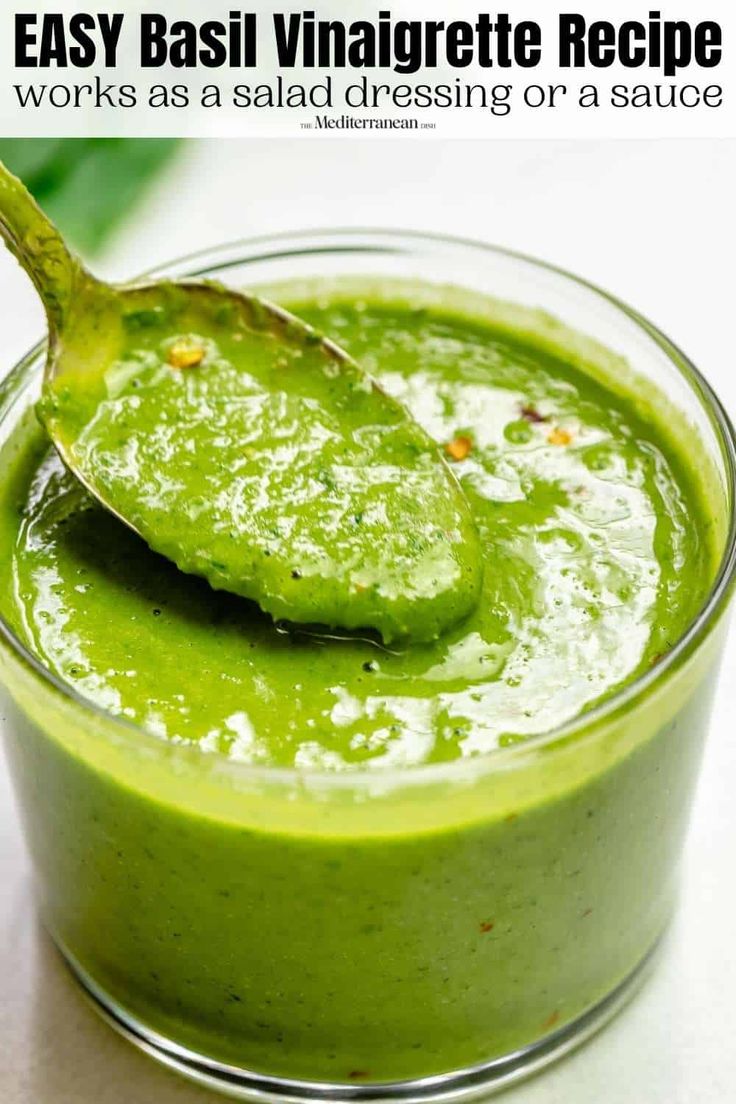 a green smoothie in a small glass with a spoon sticking out of it and the text easy basil vinaigrete recipe works as a salad dressing or a sauce