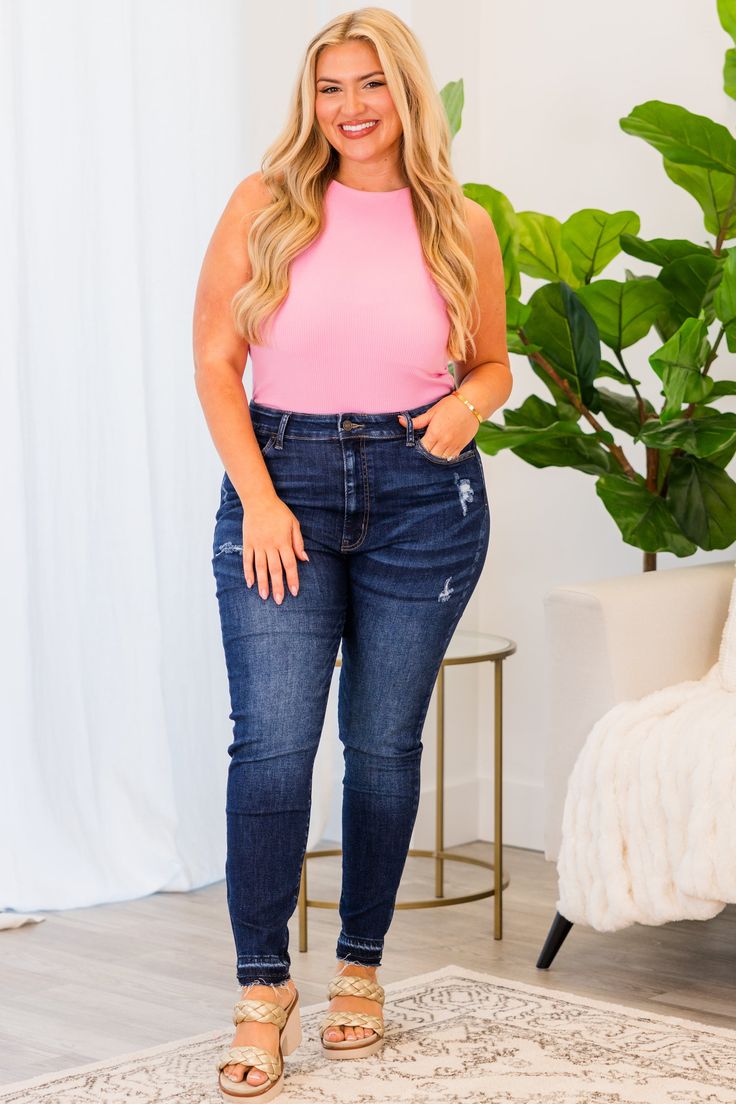 Expertly designed for both style and comfort, these jeans in dark wash feature subtle distressing and a frayed hemline! The high-waisted fit is perfect for pairing with your favorite bodysuit or blouse, making them versatile for any occasion! Elevate your denim game with these must-have jeans! 71% Cotton, 26% Polyester, 3% Spandex Short Dresses Party, Wedge Heel Sneakers, Poncho Shawl, Jeans Dark Wash, Summer Chic, Jumpsuit Shorts Rompers, Shop Maxi Dresses, Babydoll Dress, Dress Romper