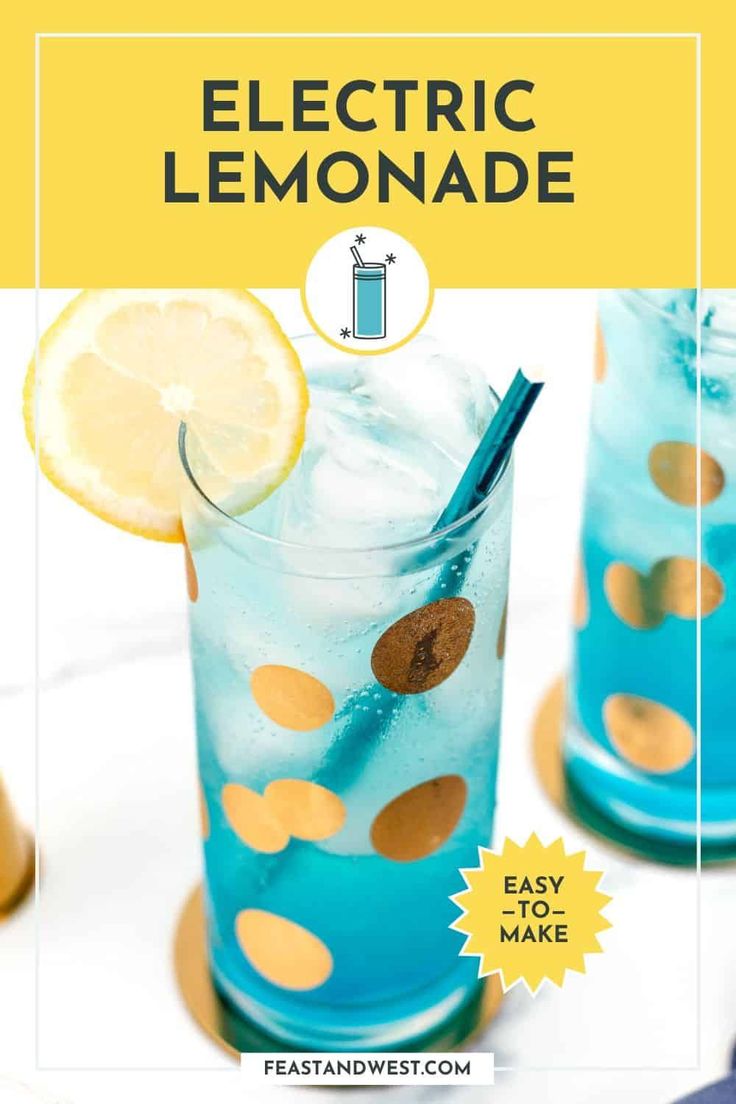 a blue glass filled with lemonade on top of a table