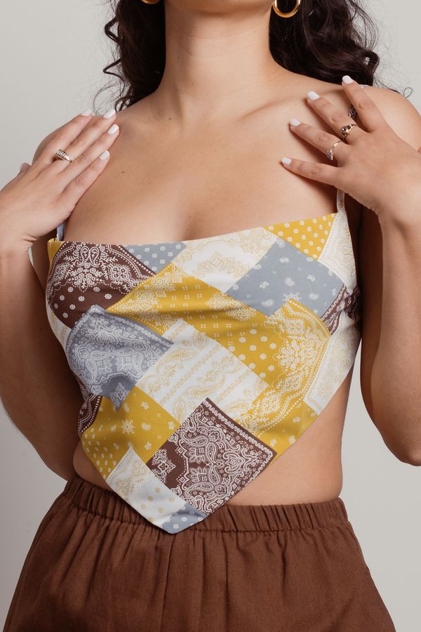 "Get Music Festival Vibes With The Youra Brown Patchwork Pattern Handkerchief Crop Top. This Cami Crop Top Features Adjustable Straps, An Adjustable Tie Back Closure, And A Square Neckline. Pair This Top With High Waisted Pants And Strappy Heels For A Fun Festival Look." Handkerchief Top Outfit, Party Tops For Women Classy, Patchwork Top Diy, Backless Top Pattern, Tube Top Pattern, Vietnam Clothes, Crop Top Sewing Pattern, Bustier Pattern, Boho Festival Outfit