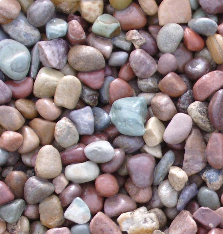 rocks with a bible verse written on them in front of the image is a pile of stones