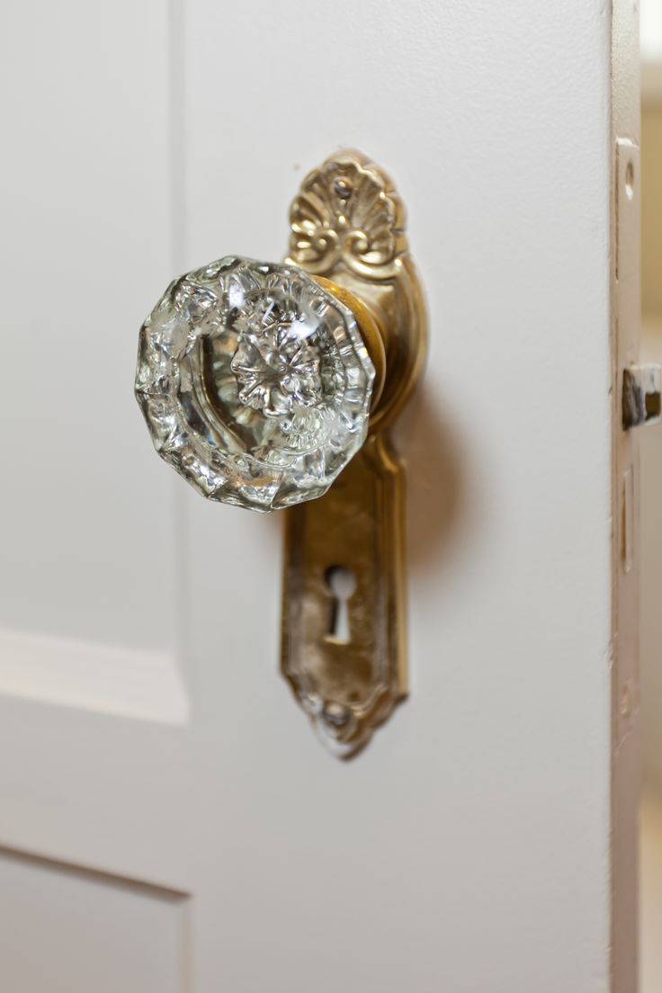 an ornate door handle with a crystal knob