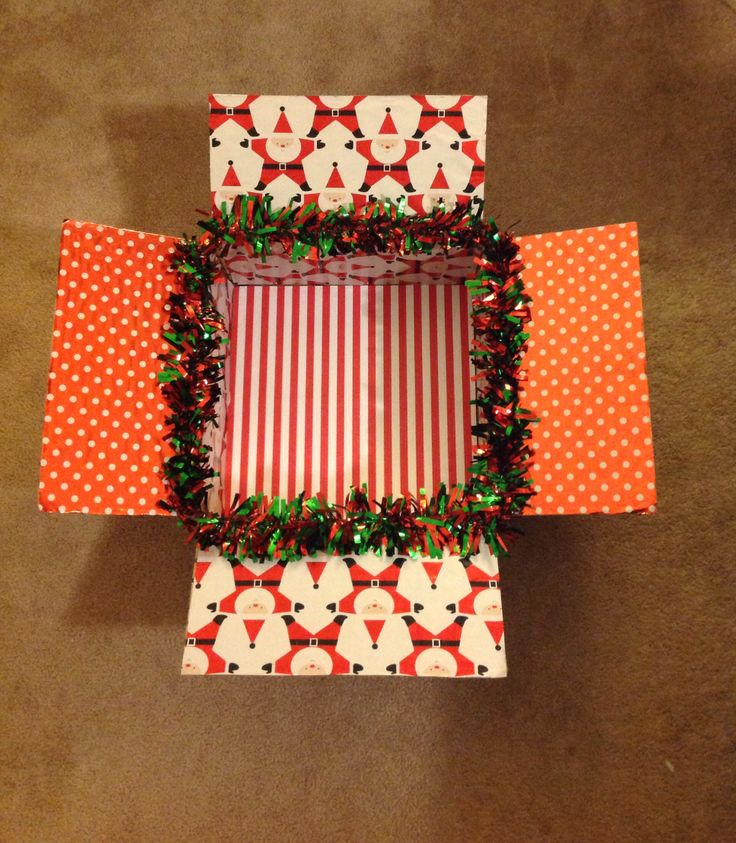 three boxes are decorated with christmas decorations