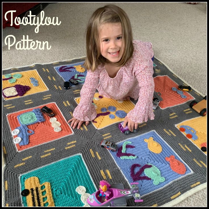 A delightful and colorful children's crochet blanket pattern that doubles up as a toy! Choose your colors to make it for either a boy or girl. This play mat is safe and inviting! Fun and easy to make....a perfect gift! There are 9 individual squares that are sewn together and decorated with cars, trucks, whimsical houses and trees, clouds and even sea life! A simple border completes this delightful throw. The entire blanket measures about 45 x 45 inches. This listing is for a PDF crochet pattern in English. Pattern will be instantly downloaded through Etsy. Please allow a little time for the transaction to complete itself. You are welcome to sell the finished blanket. Please provide a link with credit to this shop. Help and coaching is always available.  This listing is for the pattern and Playmat Baby, Baby Playmat, Crochet Game, Blanket Kids, Circular Knitting Machine, Toys For Tots, Crochet Fairy, Crochet Car, Crochet Rug Patterns