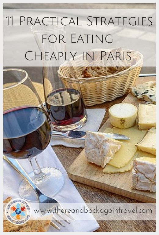 wine, cheese and crackers on a table with the words practical strategies for eating cheaply in paris