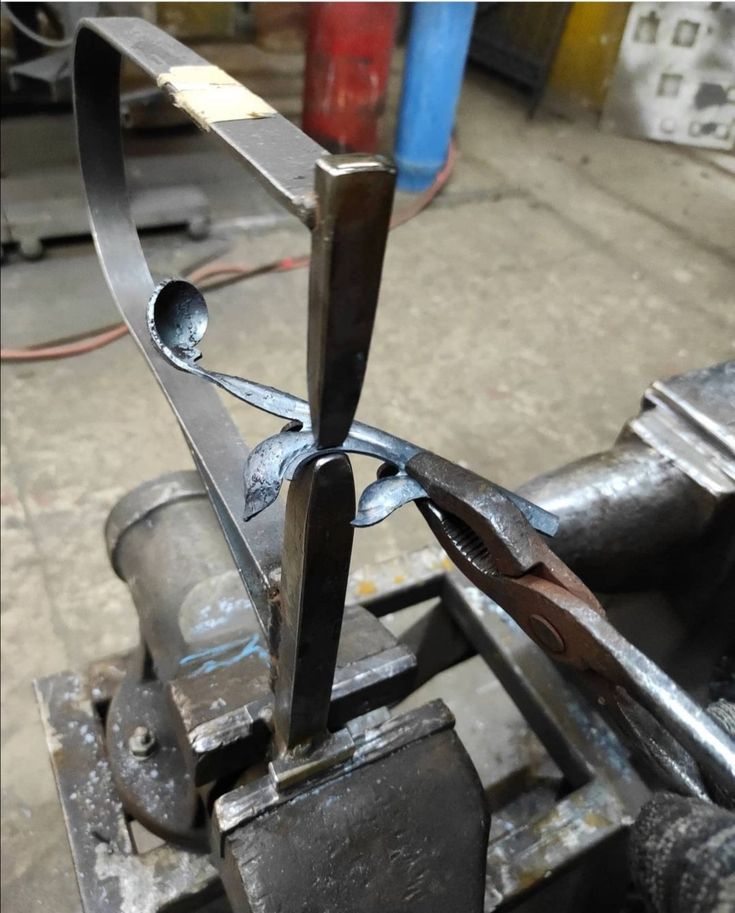 a pair of scissors are being used to cut metal