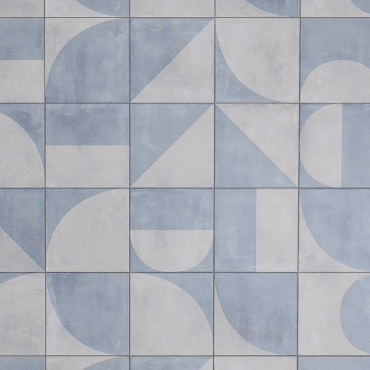 an abstract blue and white tile pattern with rounded shapes on the outside, in shades of gray