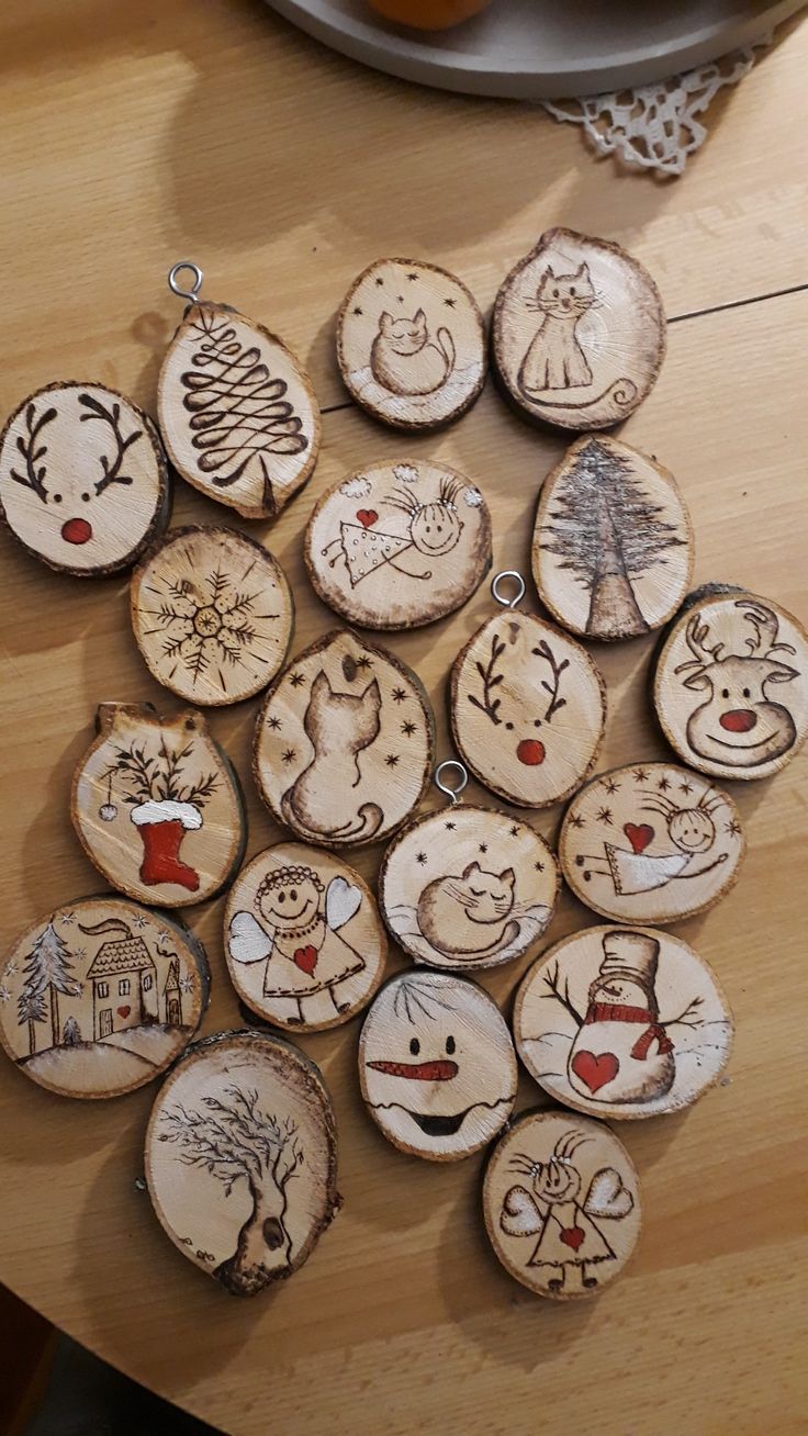 several wooden ornaments are arranged on a table