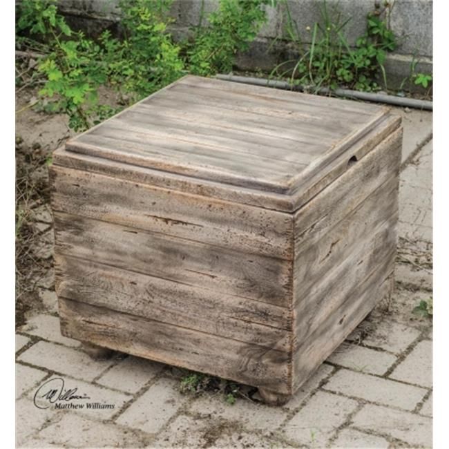 an old wooden box sitting on the ground