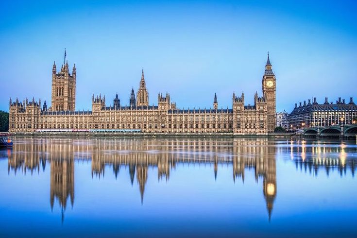 the big ben clock tower towering over the city of london