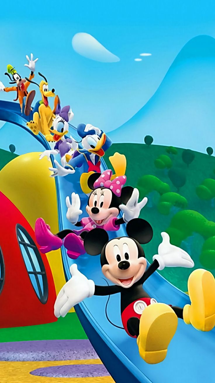 mickey mouse and friends are riding on a slide