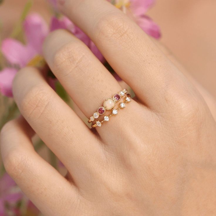 Crafted to give you that positive celestial vibe - the ring has the Opal daintily sited and beaming like a full moon, while gravitating towards the Pink Tourmaline and White Topaz to give you a supernatural sparkle. ✦ Available in both 14K yellow gold vermeil (14K yellow gold plated over a sterling silver base) and 10K solid yellow gold. Yellow Topaz Ring, Bff Rings, Celestial Ring, Stack Rings, Opal Engagement Ring, Opal Engagement, Vermeil Jewelry, Tourmaline Ring, Simple Fashion