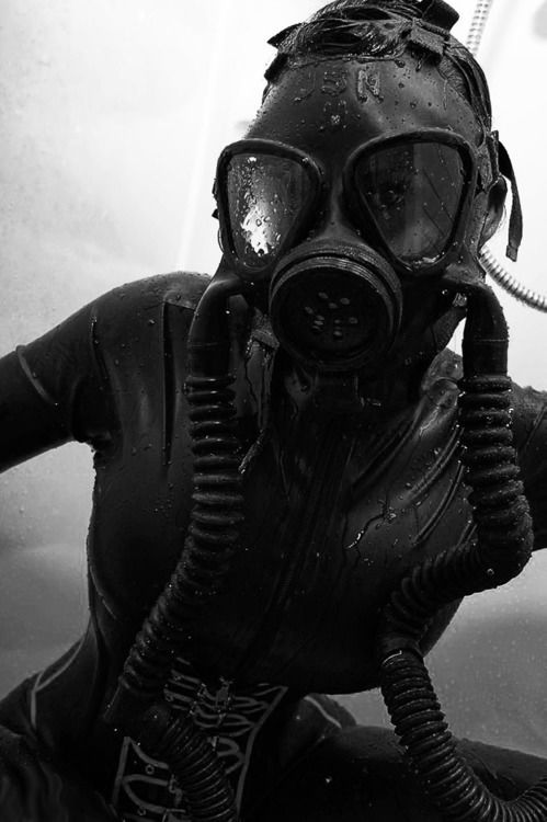 a man wearing a gas mask and diving gear